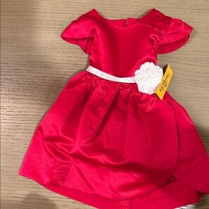 Red Satin Dress with White Flower Accent